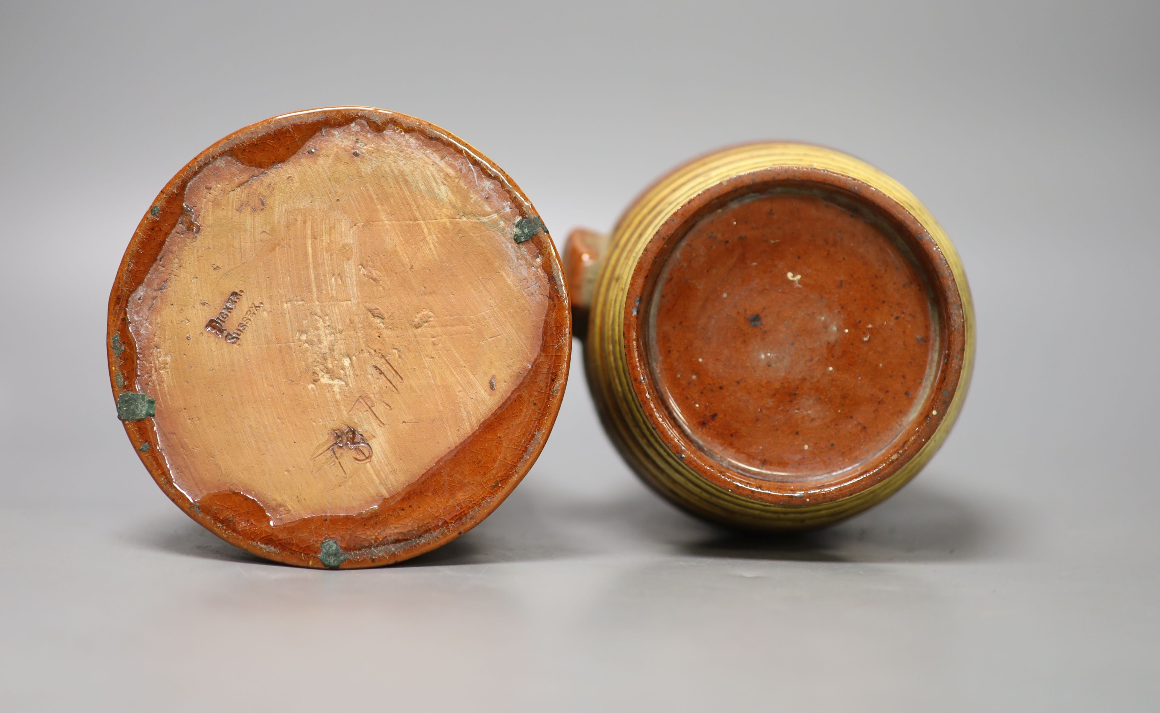 A Dicker pottery jar and cover, marked 'Jane Butler Sedlescombe Sussex August 20 1815' and a similar barrel monogrammed WB1813